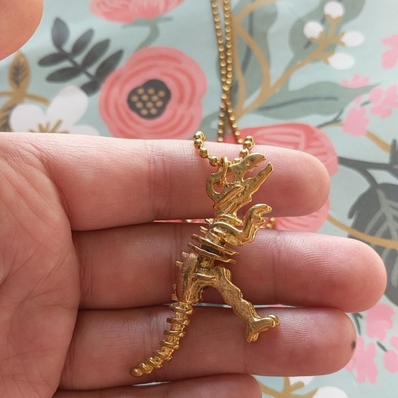 Modcloth Jewelry - Nwot long gold dinosaur bone t rex necklace long